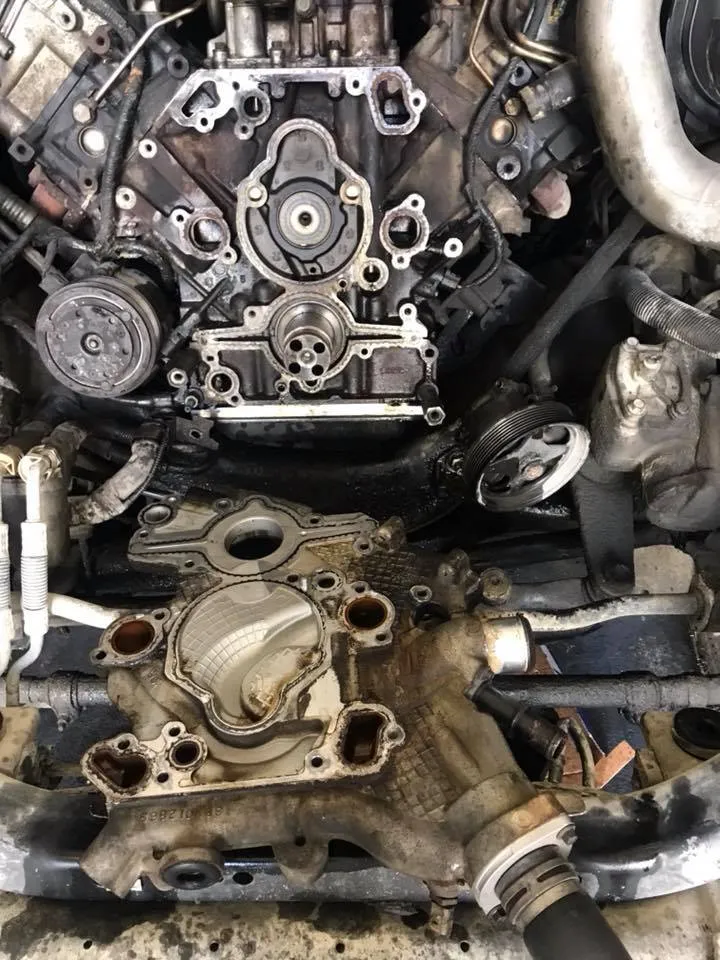 The front of an engine opened up for timing work